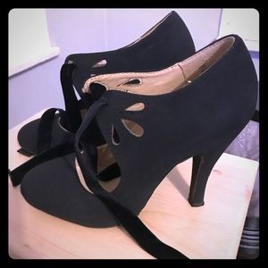 Black suede cutout heels w/ velvet tie